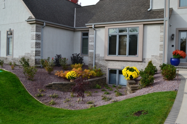 Retaining walls, stone mulch and plantings installed in Wisconsin